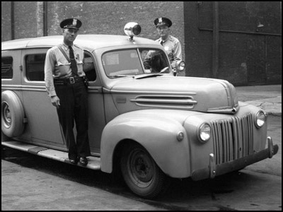Howard Cessna with Police Car